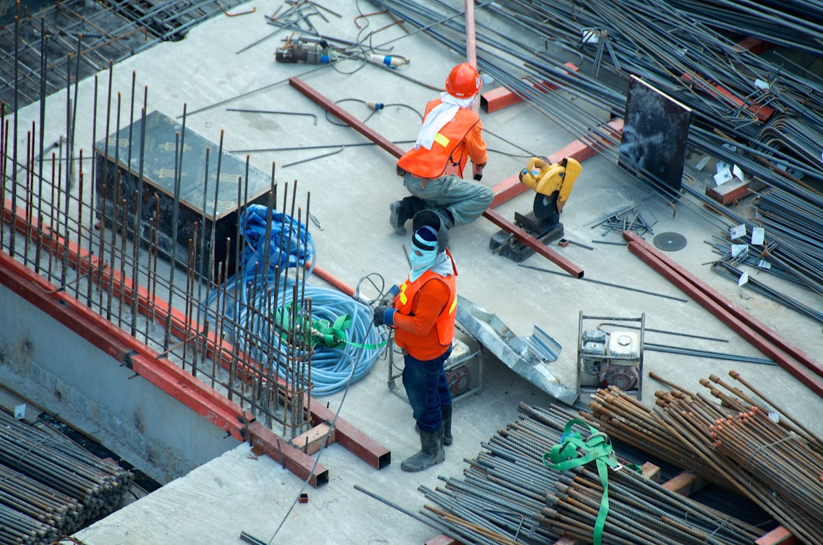 UK construction team reviewing plans on building site